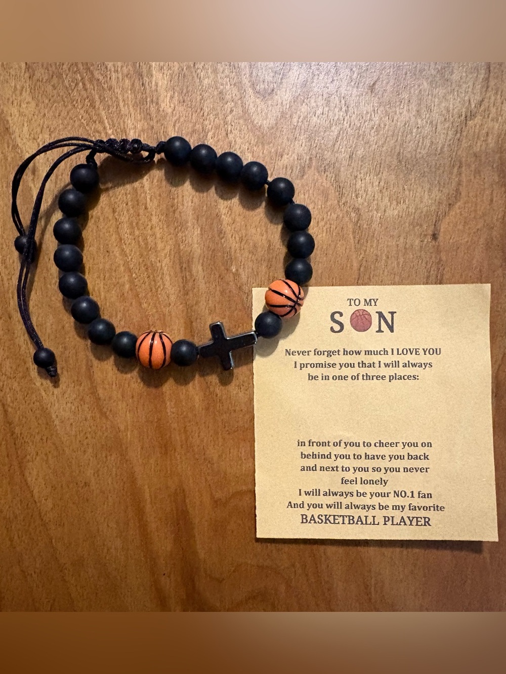 Black Beaded Bracelet with Orange Basketball Beads and Cross